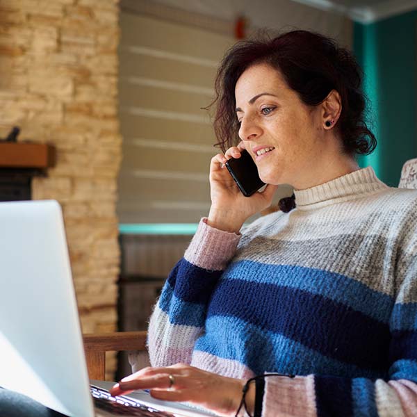 Women speaking on phone with care manager