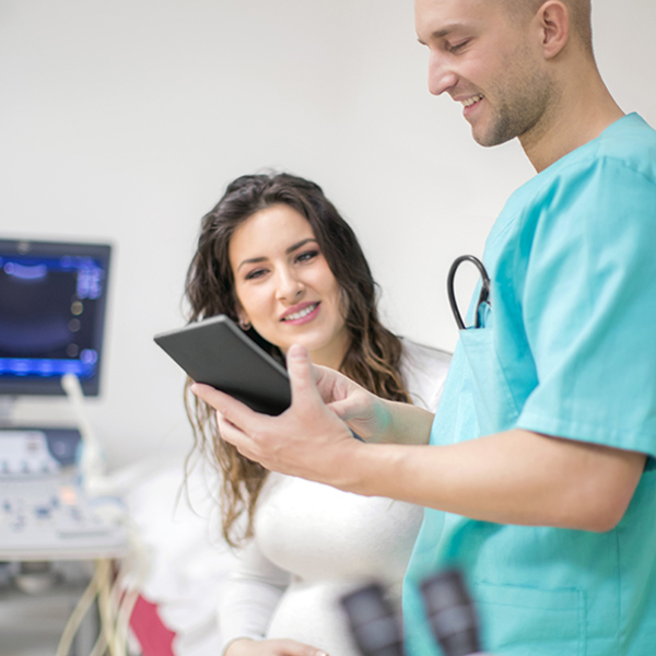 Nurse Reviewing with a Patient