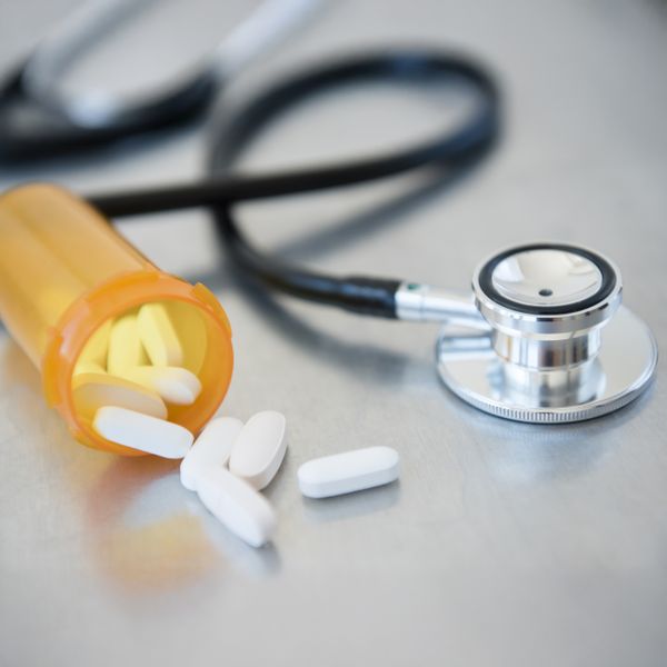 Stethoscope and medication on a table