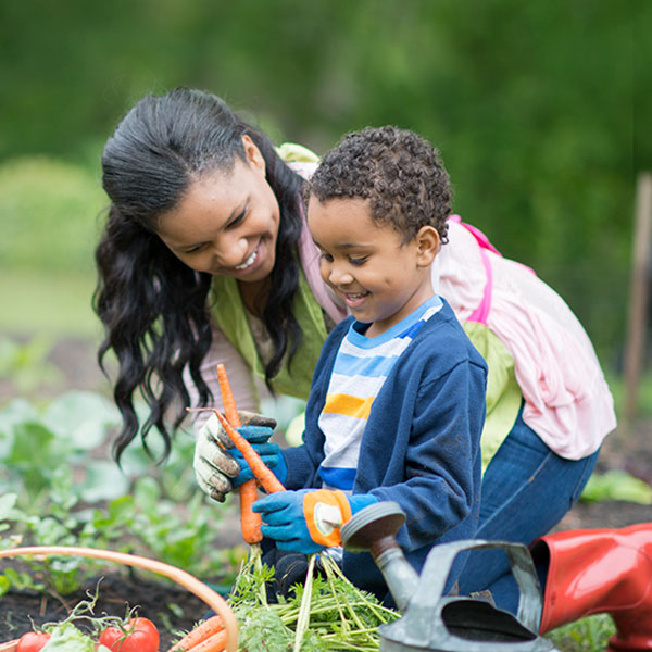 Mother and son in garden